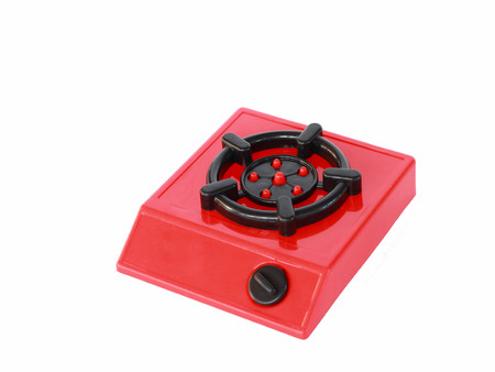 Red stove isolated on whiteの写真素材