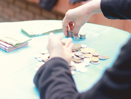 Asian woman counting money
