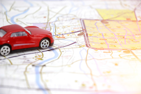 pastic car toy background to travel concept.の写真素材