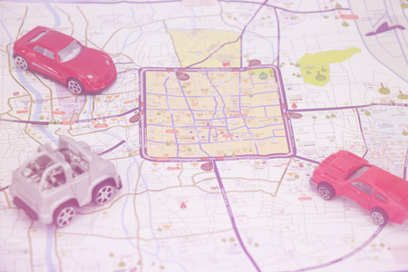 pastic car toy background to travel concept.の写真素材