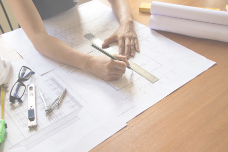 Desk of Architectural working project in construction site