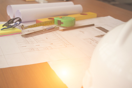 Desk of Architectural working project in construction siteの写真素材