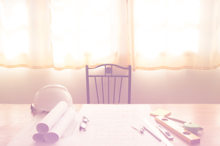 Desk of Architectural working project in construction site