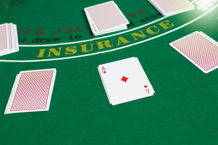 Casino equipment placed on the green floor for risky gambling for the people who want to get rich.の写真素材