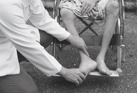 Physical therapist Disabled wheelchair with professional care.conceptの写真素材