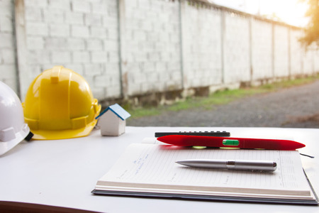Architect desk ,Business,engineering concept,construction site, soft focus, vintage tone, working with blueprints in the officeの写真素材