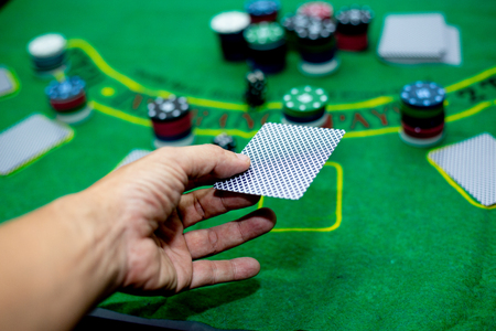 Casino equipment placed on the green floor for risky gambling for the people who want to get rich.の写真素材