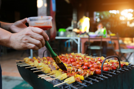 Barbeque Grill Street Food in thailand,Eat outdoors in a happy family.の写真素材
