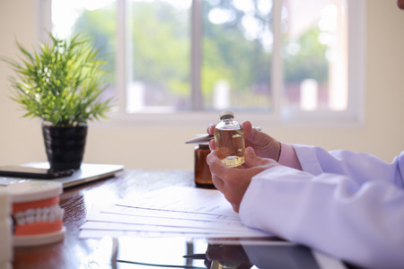 Dentist Preparing for the treatment of patients with oral and dental problems.Dentist desk ideas conceptの写真素材