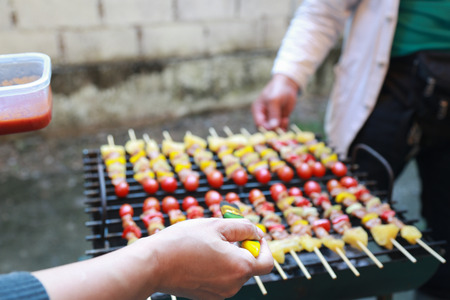 Barbeque Grill Street Food in thailand,Eat outdoors in a happy family.