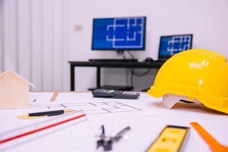 Architect desk tool working with blueprints in the office.Home Project to Offer Management.