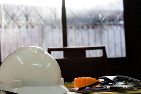 Desk of Architectural working project in construction siteの写真素材