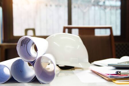 Desk of Architectural working project in construction site