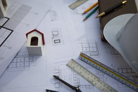 Desk of Architectural working project in construction site,With drawing equipment concept.の写真素材