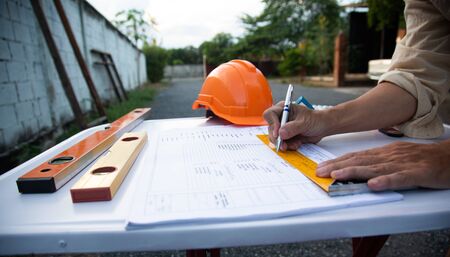 Architectural work site desk background construction project ideas concept, With drawing equipmenの写真素材