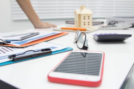 Business man hand working with notepad on workplace in office, Search Engine Optimization, lifestyle...
