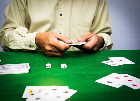 Casino equipment placed on the green floor for risky gambling for the people who want to get rich.