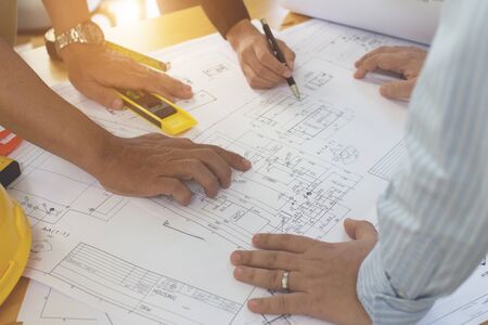 Engineering team consulting and analyzing the high-rise building projects in the city.Home Project...