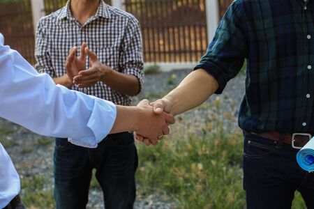Engineering shaking  Hands Architectural with the agreement to agree on a residential construction project.conceptの写真素材