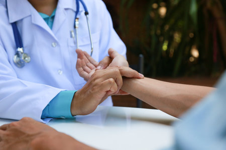 Doctors are encouraging patientson doctors table in hospital. to have the power to fight off illness.の写真素材