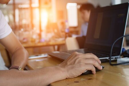 businessman typing with laptop.working at coffee shop.Prepare a proposal to the Special Project...