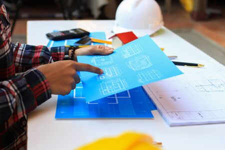 Engineers are meeting to discuss the design of a residential project.concept