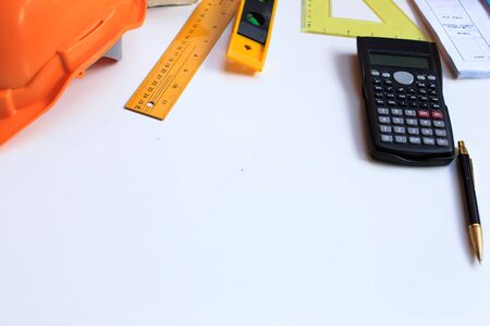 Architect desk concept,construction site working with blueprints in the office.Home Project to Offer Managementの写真素材