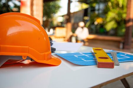 Architect desk concept,construction site working with blueprints in the office.Home Project to Offer Managementの写真素材