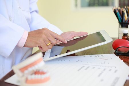 Looking for information about preparing for the treatment of patients with oral and dental problems.の写真素材