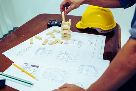 Engineers are working with architects to agree on a residential construction project.concept
