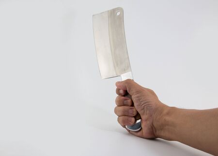 Close-Up Of Meat Cleaver Against White Backgroundの写真素材