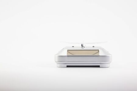 Rotating product display stand placed on a white backgroundの写真素材