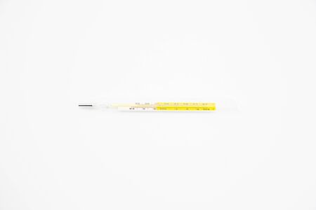 Thermometer, placed on a white backgroundの写真素材