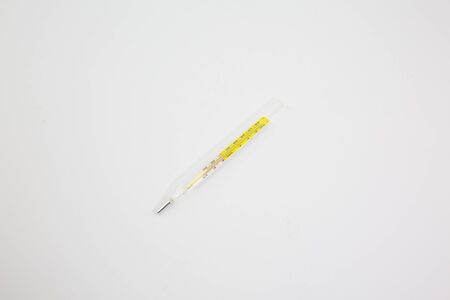 Thermometer, placed on a white backgroundの写真素材