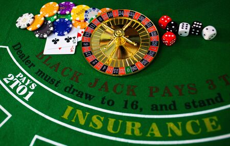 Casino equipment placed on the green floor for risky gambling for the people who want to get rich.の写真素材