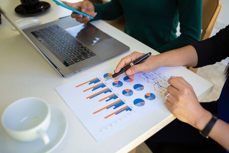 Team Businessmen are discussing and planning a long-term investment with tax law.power project conceptの写真素材
