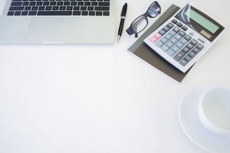business team hands searching for data on mobile phone  with analyzing charts at his workplace.の写真素材