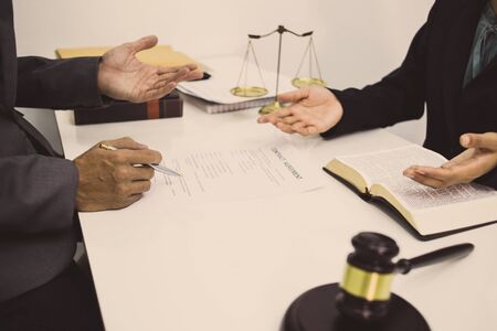 close-up shot of the lawyer's work explaining the client's winning strategyの写真素材