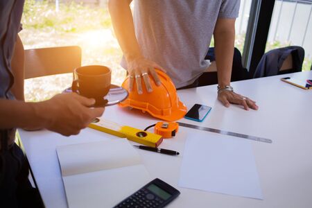group of Engineer and Architect Brainstorming discuss project  at Construction Site with blueprint.conceptの写真素材