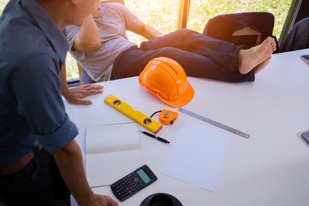 group of Engineer and Architect Brainstorming discuss project  at Construction Site with blueprint.conceptの写真素材