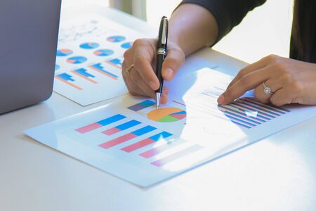 Business working analysts investment status on the strength of money in the global economy.conceptの写真素材