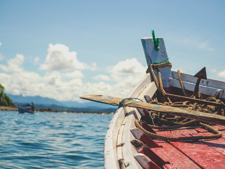 Beautiful beach of Ngapali with fisherman boatの写真素材