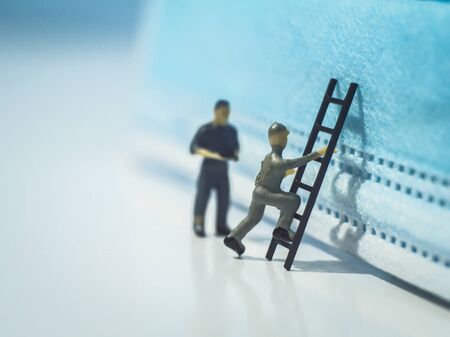 Miniature people : Mask quality inspection teamの写真素材