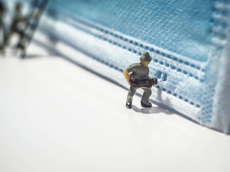 Miniature people : Mask quality inspection teamの写真素材