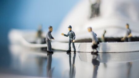 Miniature people : Mask quality inspection teamの写真素材