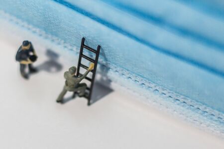 Miniature people : Mask quality inspection teamMiniature people : Mask quality inspection teamの写真素材