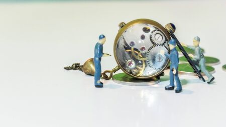 iniature people check and repair mechanical antique watch, Watch repairの写真素材