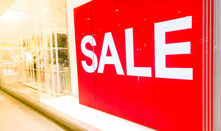 red-white "SALE" label in store with copy spaceの写真素材