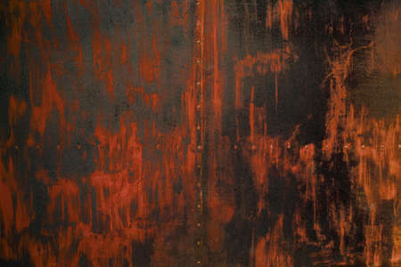 old red-brown metal sheet surface with painting brush pattern, red-brown metal sheet abstract backgroundの写真素材