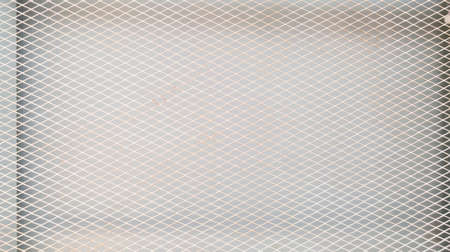 selective focus of white metal mesh, white metal mesh abstract background, white metal mesh with rustの写真素材